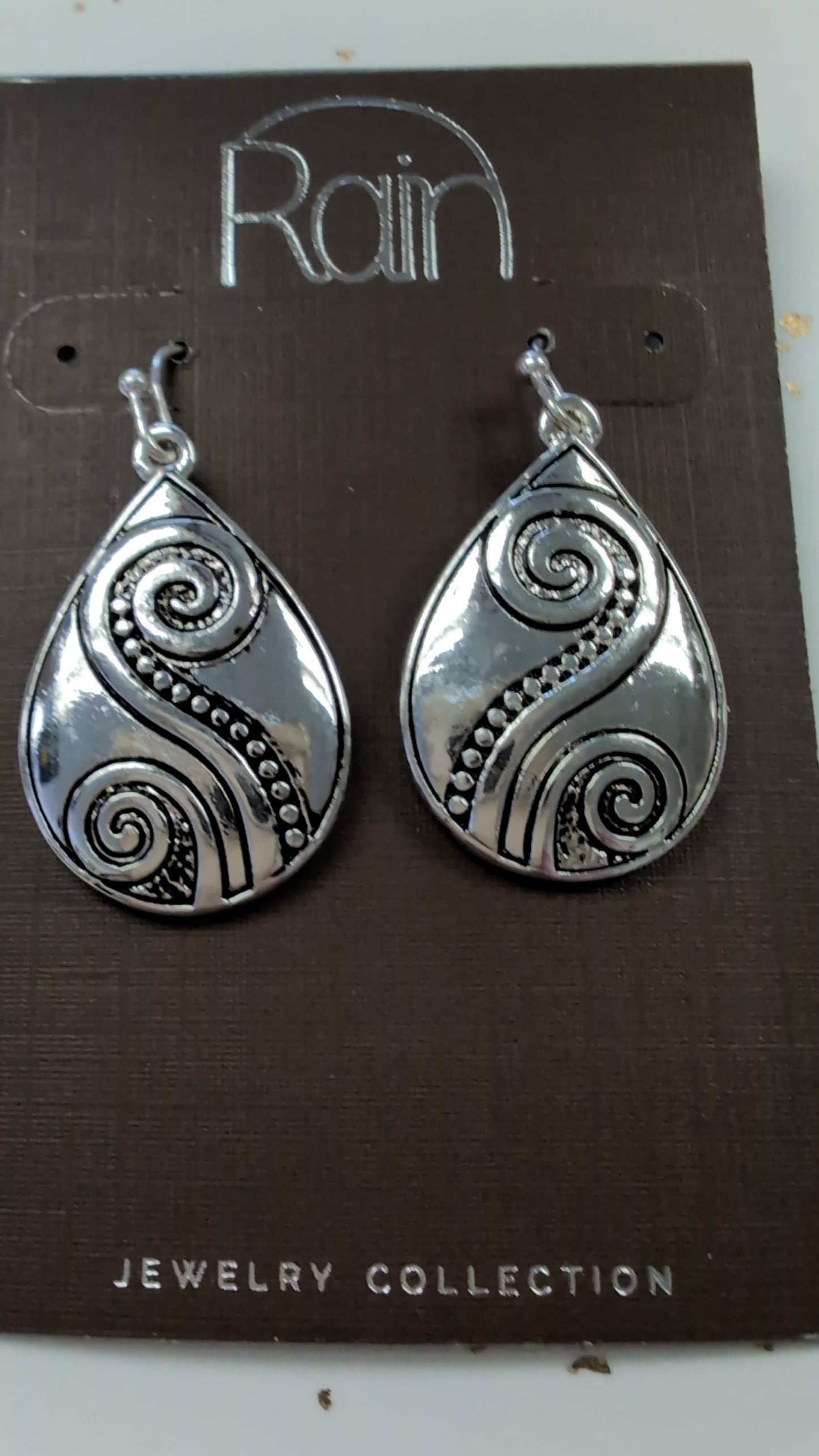 Silver Swirled Design Teardrop Earrings