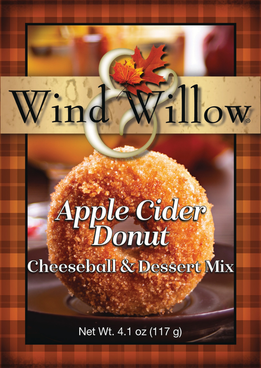 Front packaging of Wind Willow Apple Cider Donut Cheeseball & Dessert Mix, featuring a golden-brown donut on a plate with the brand name and product name clearly displayed.