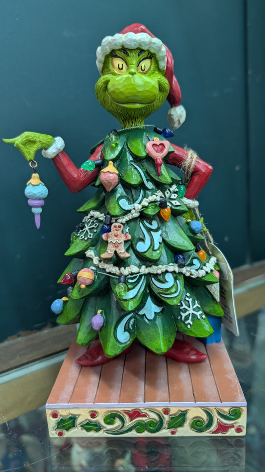 Grinch Dresses As A Christmas Tree