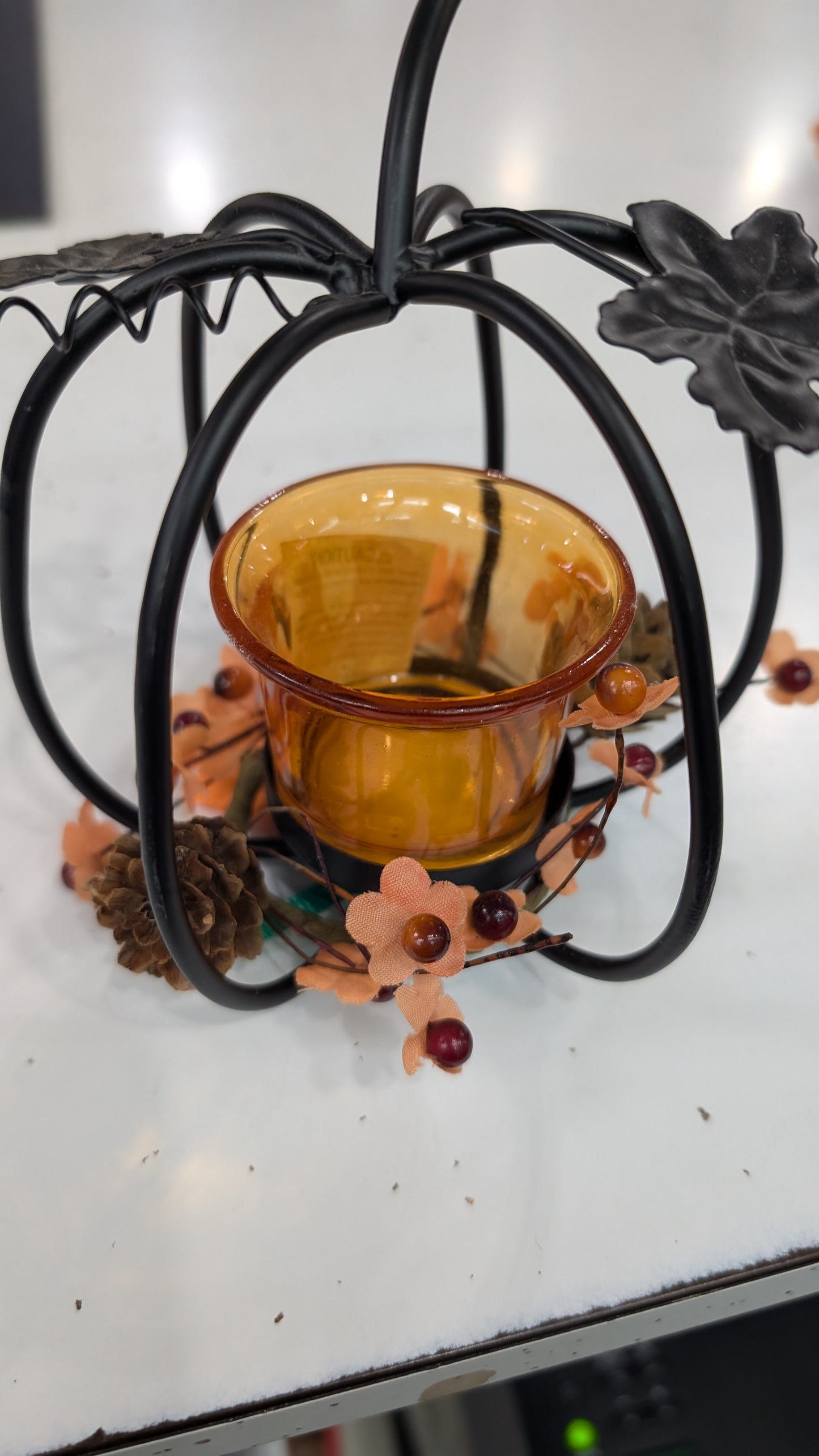 Metal pumpkin candle holder