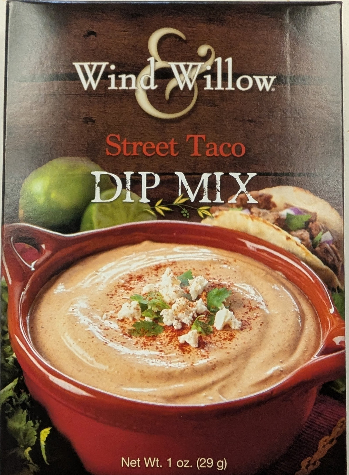 Package of Wind & Willow Street Taco Dip Mix with an image of the dip in a red bowl on the front.