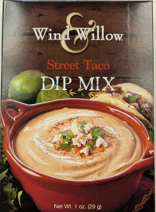 Package of Wind & Willow Street Taco Dip Mix with an image of the dip in a red bowl on the front.