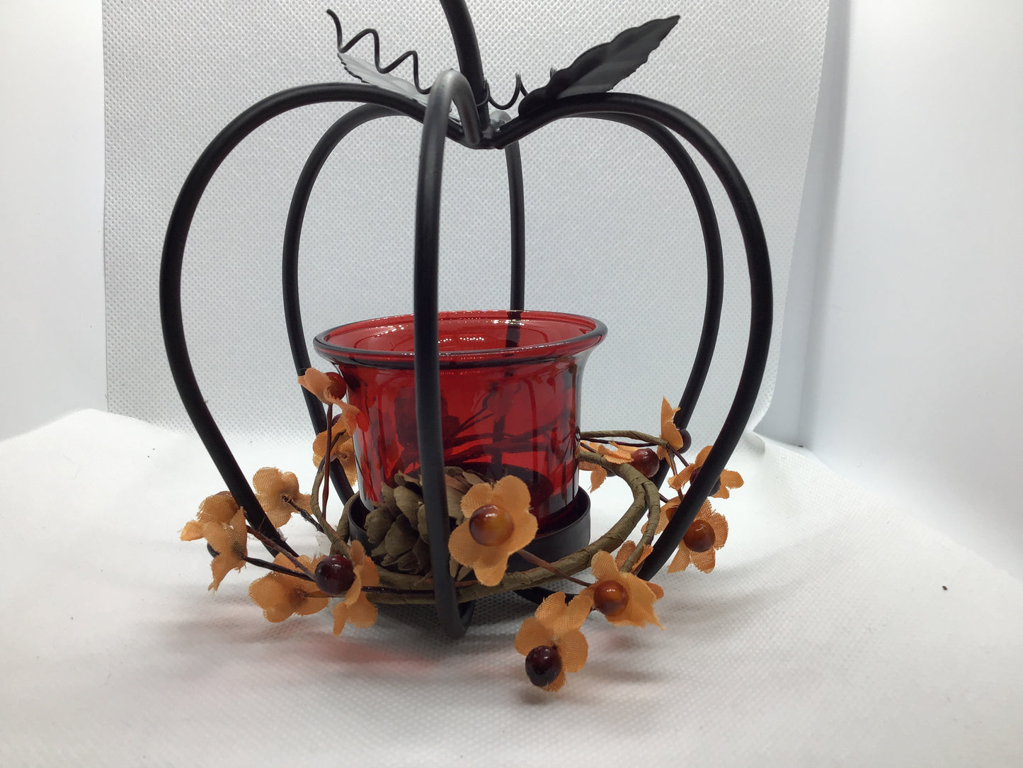 Metal pumpkin candle holder